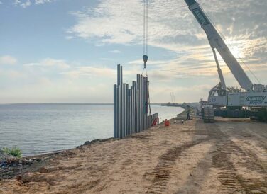 crane laying beams for SH 334 construction